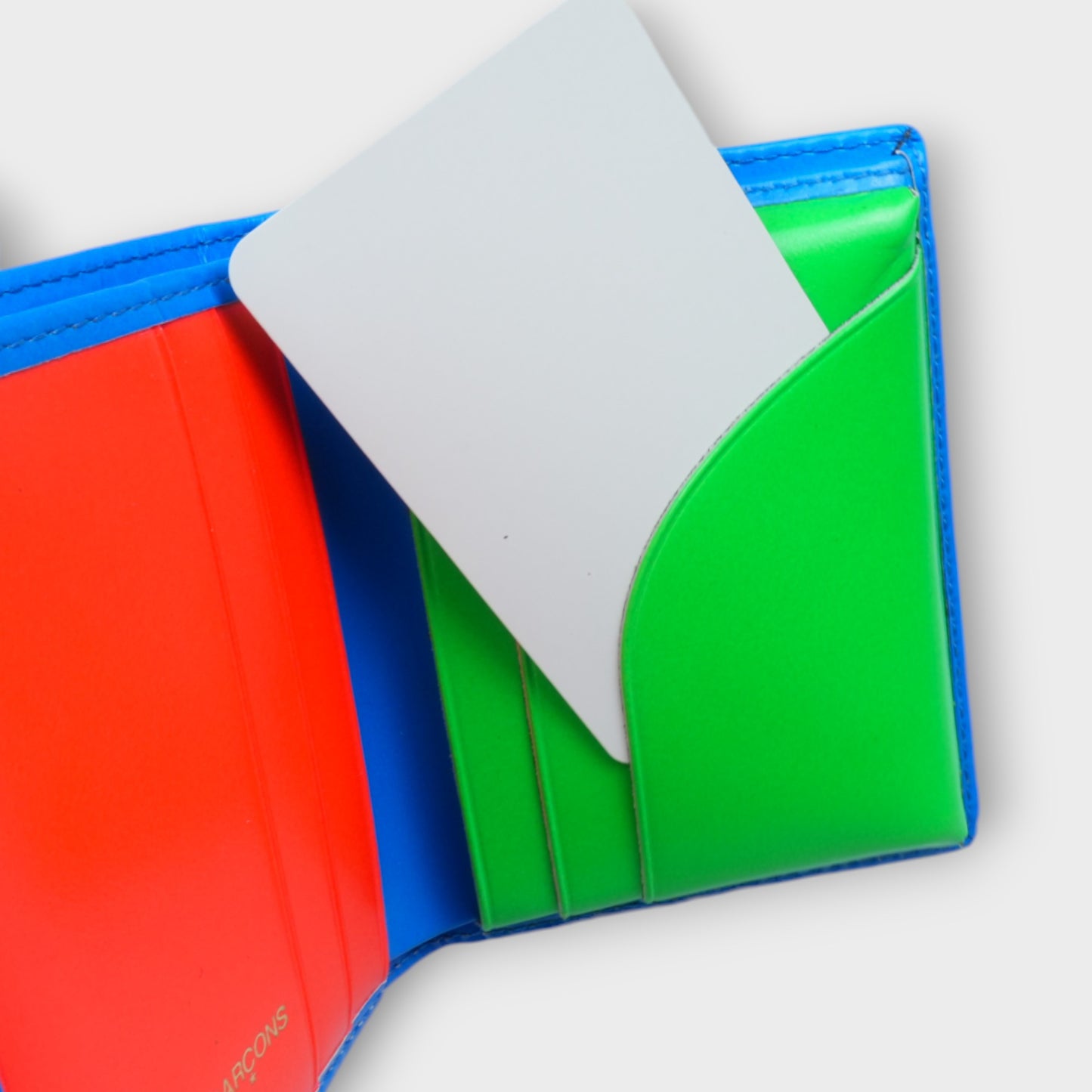 COMME des GARCONS SUPER FLUO