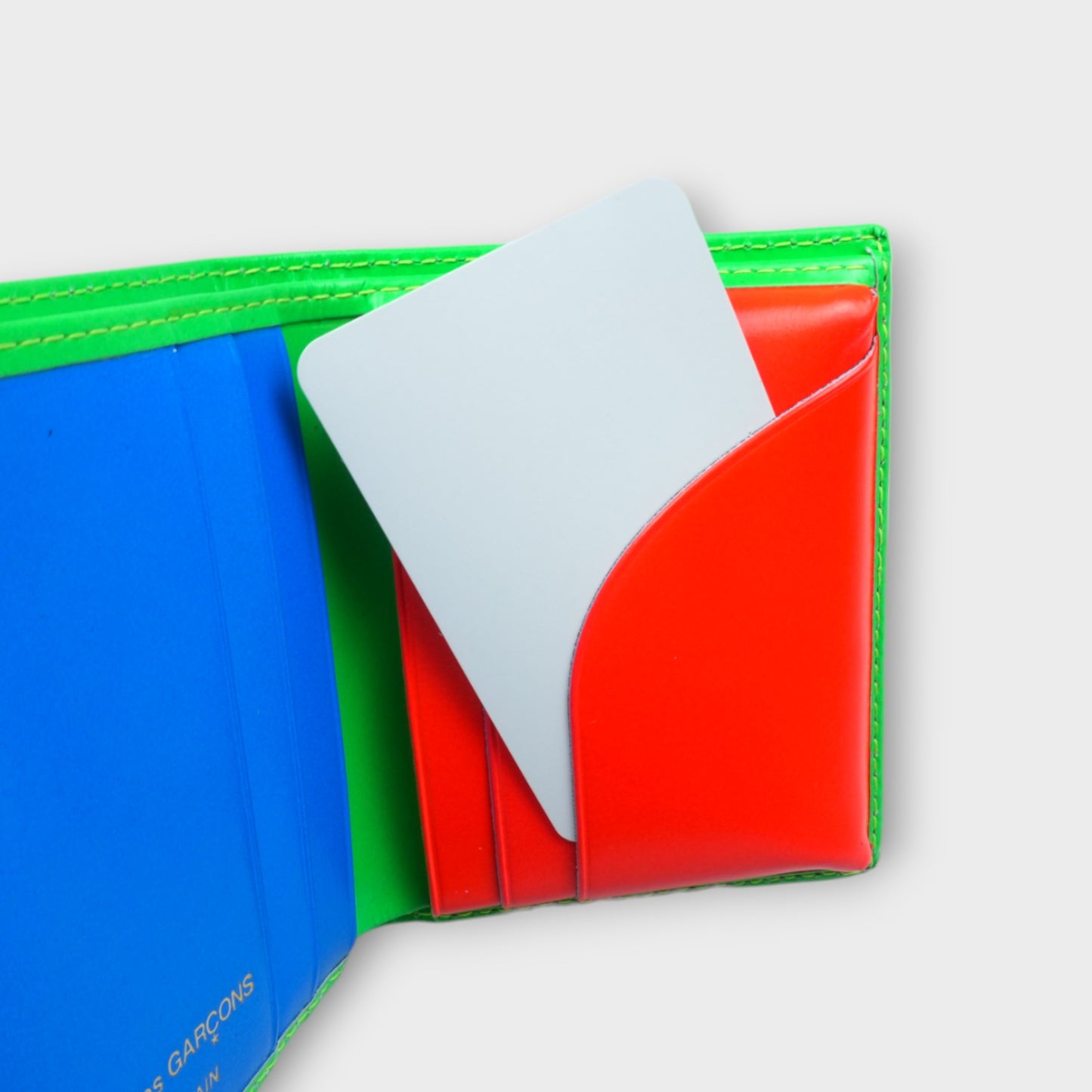 COMME des GARCONS SUPER FLUO