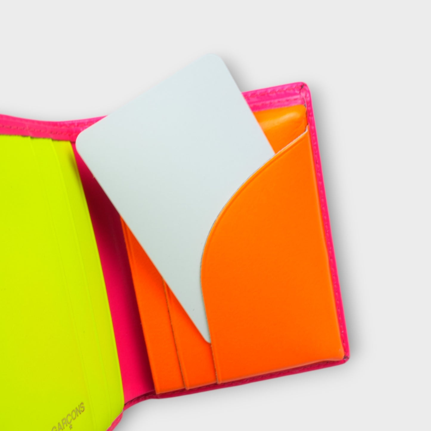 COMME des GARCONS SUPER FLUO