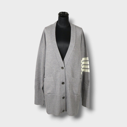 THOM BROWNE EXAGGERATED FIT V NECK CARDIGAN W/ 4 BAR STRIPE IN FINE MERINO WOOL