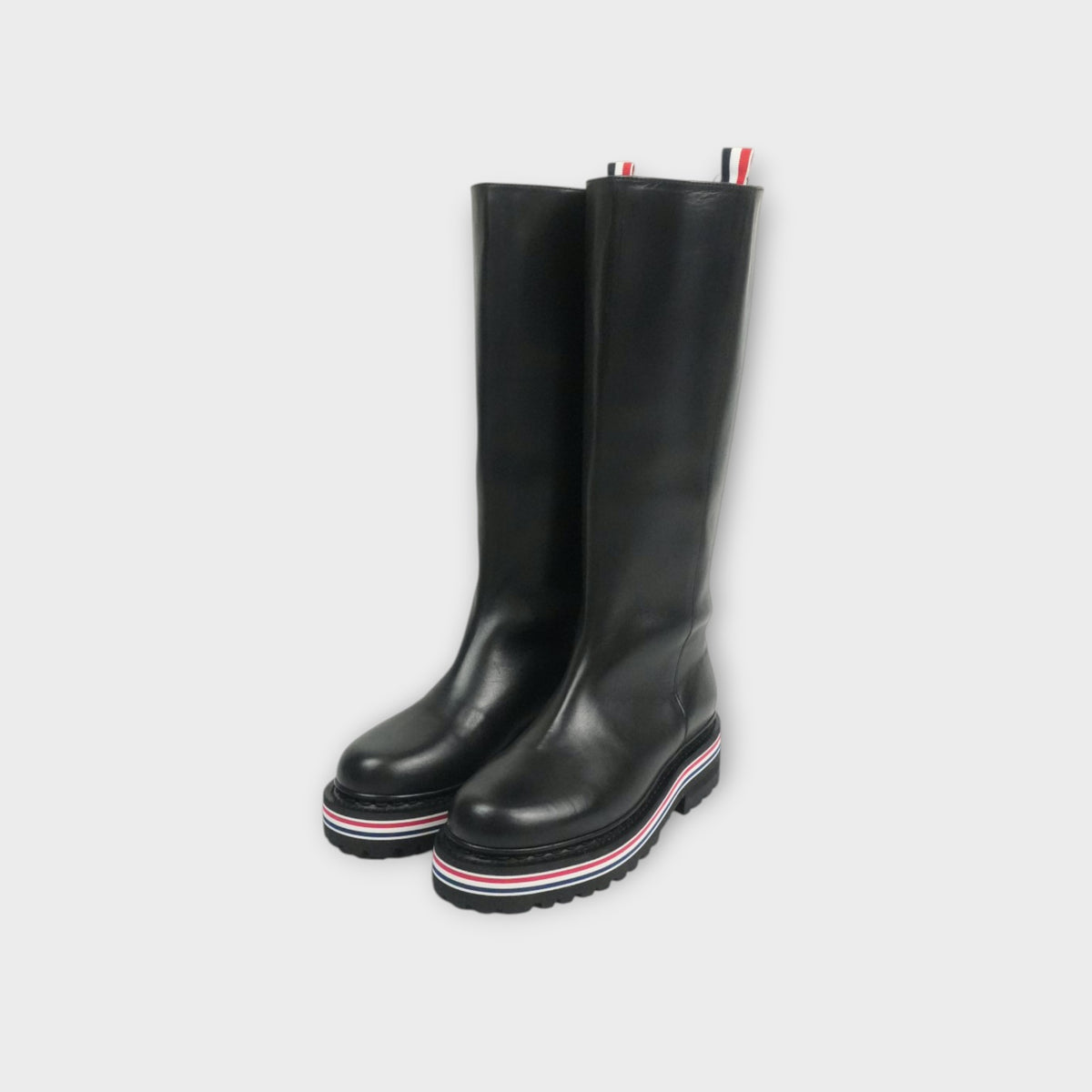 THOM BROWNE KNEE-HIGH BOOT W/ ALL TERRAIN SOLE IN VITELLO CALF LEATHER