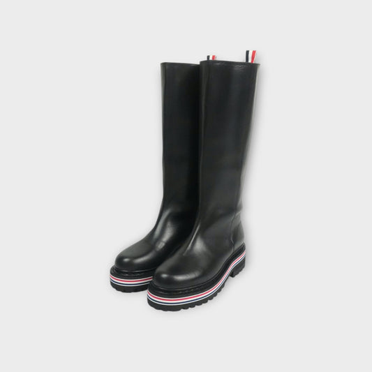 THOM BROWNE KNEE-HIGH BOOT W/ ALL TERRAIN SOLE IN VITELLO CALF LEATHER