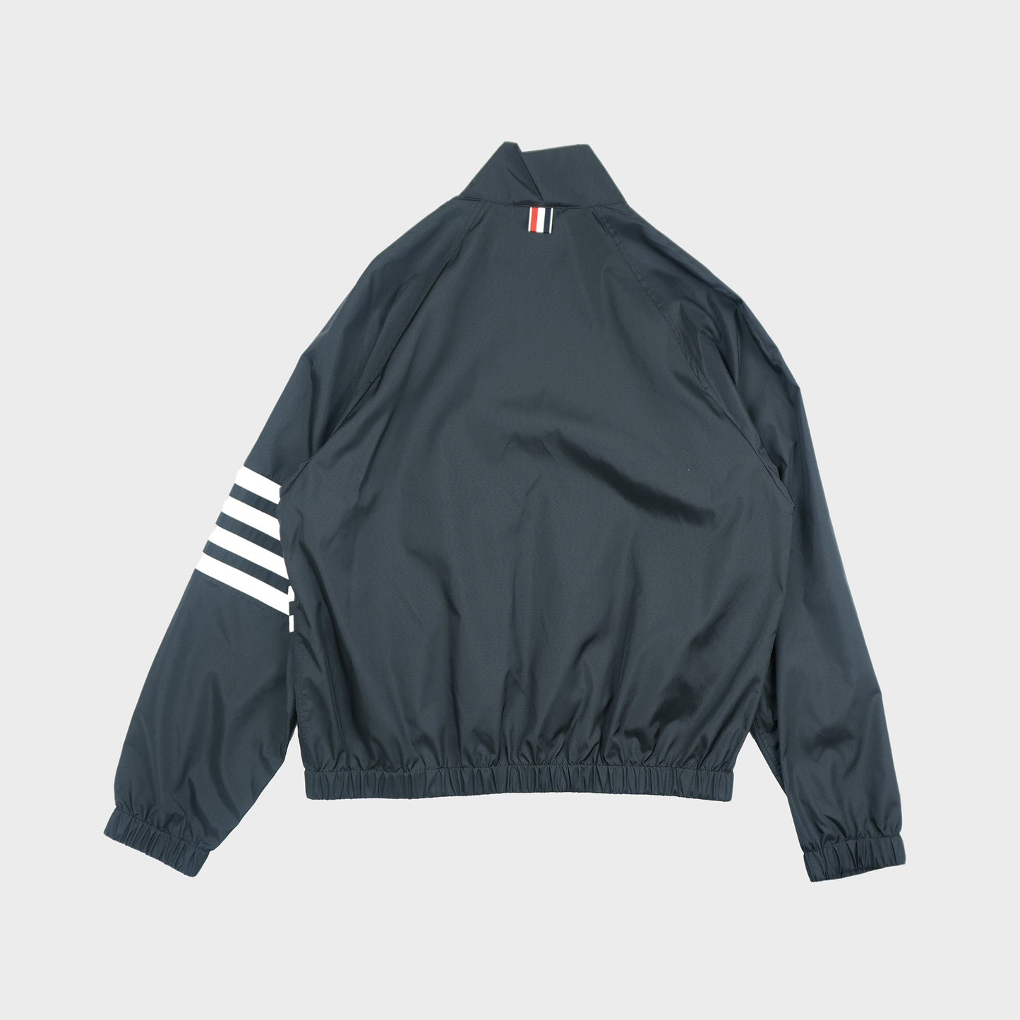 THOM BROWNE ZIP FRONT RAGLAN TRACK JACKET W/ 4 BAR IN SHINY RIPSTOP