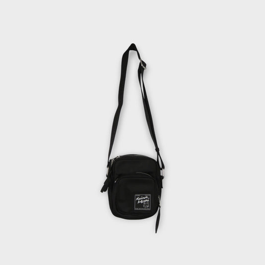 MAISON KITSUNÉ THE TRAVELLER CROSSBODY POUCH